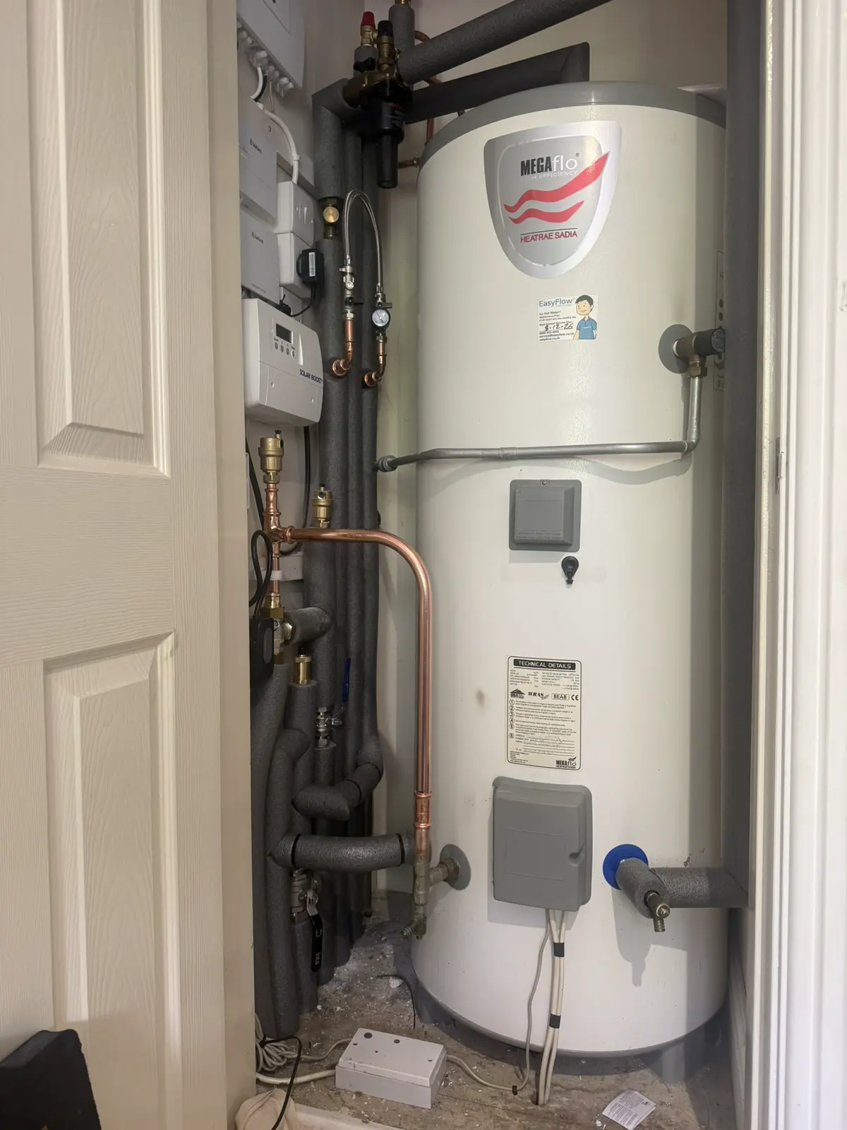 Existing unvented hot water cylinder reused for the heat pump installation