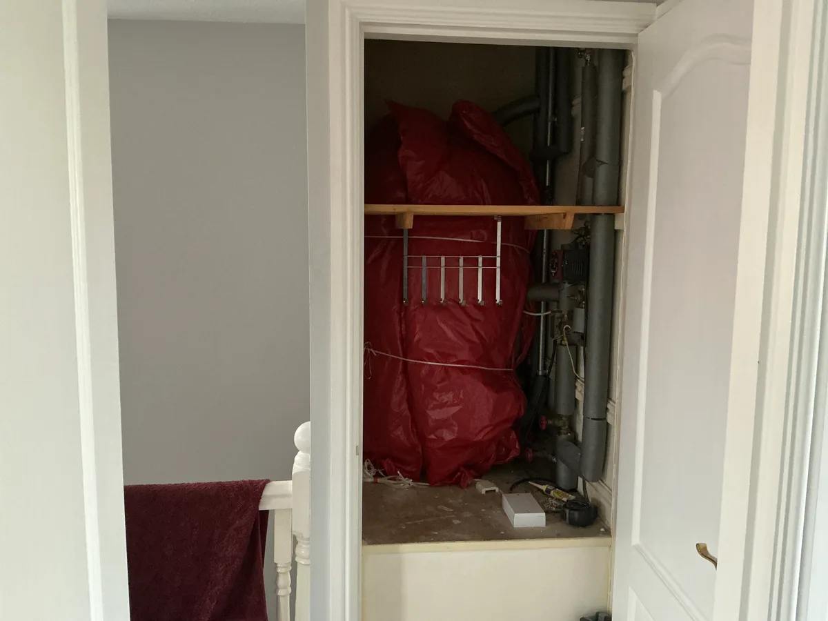 Old vented hot water cylinder before removal in Sale