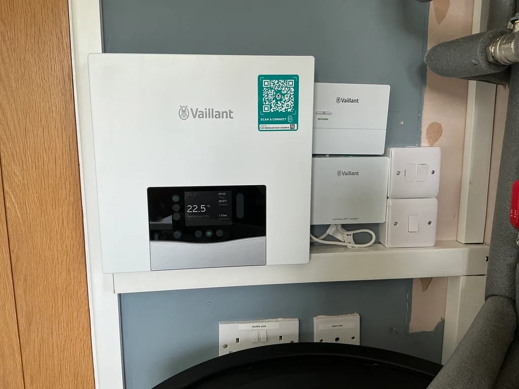 Vaillant heat pump controls installed above the hot water cylinder